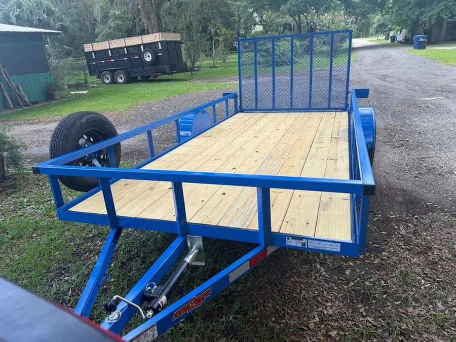 A blue utility trailer with a freshly boarded timber deck ready for a job